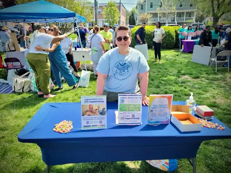 Quinn tabling at a community event